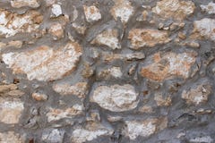 Raue Steinwandbeschaffenheit mit großen Felsen stockfotografie Raue Steinwandbeschaffenheit mit großen Felsen stockfotografie