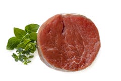 Raw Beef Steak with Herbs Isolated stock images Raw Beef Steak with Herbs Isolated stock images
