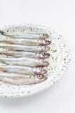 Raw mackerel on a plate. White background, top view, space for text. stock photos Raw mackerel on a plate. White background, top view, space for text. stock photos