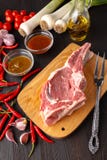 Raw meat assortment - beef, lamb, chicken on a wooden board royalty free stock images Raw meat assortment - beef, lamb, chicken on a wooden board royalty free stock images