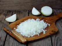 Raw onion, chopped very small cubes with knife stock image Raw onion, chopped very small cubes with knife stock image