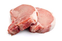 Raw pork chops on white background