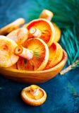 Raw Wild Saffron Milk Cep Mushrooms On Dark Old Rustic Background. Lactarius Deliciosus. Rovellons, Niscalos. Organic Mushrooms Stock Photos Raw Wild Saffron Milk Cep Mushrooms On Dark Old Rustic Background. Lactarius Deliciosus. Rovellons, Niscalos. Organic Mushrooms Stock Photos