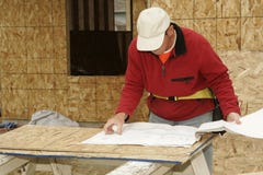 Reading The Plans Royalty Free Stock Photo Reading The Plans Royalty Free Stock Photo