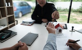 Real estate agent have meeting with customer. sale & purchase pr Stock Photos Real estate agent have meeting with customer. sale & purchase pr Stock Photos