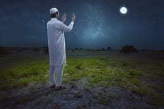 Rear view of asian muslim man praying Stock Images Rear view of asian muslim man praying Stock Images