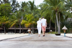 Rear View Of Senior Couple Walking On Wooden Jetty Royalty Free Stock Images Rear View Of Senior Couple Walking On Wooden Jetty Royalty Free Stock Images