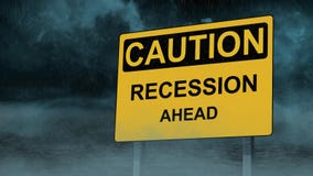 Recession Ahead Caution Road Sign with Storm 4K Loop
