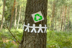 Recycle Sign With Paper Men On A Tree Stock Images Recycle Sign With Paper Men On A Tree Stock Images