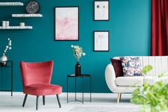 Red armchair in living room royalty free stock photography Red armchair in living room royalty free stock photography