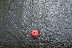 Red Buoy On The Water Surface Stock Photography Red Buoy On The Water Surface Stock Photography