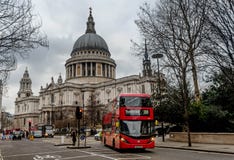 Red bus in front of Saint Pauls Cathedral in London, UK royalty free stock photo Red bus in front of Saint Pauls Cathedral in London, UK royalty free stock photo