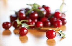 Red Cherries On Wooden Table Royalty Free Stock Images