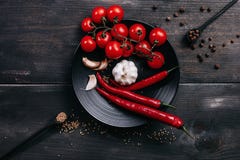Red Cherry Tomatoes On Wooden Table Board royalty free stock image Red Cherry Tomatoes On Wooden Table Board royalty free stock image