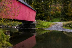 Red Covered Bridge and Gravel Road - Autumn / Fall - Vermont Stock Photography Red Covered Bridge and Gravel Road - Autumn / Fall - Vermont Stock Photography