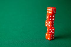 Red dices on green poker gaming table in casino. Concept online gambling. Copy space for text royalty free stock photography Red dices on green poker gaming table in casino. Concept online gambling. Copy space for text royalty free stock photography