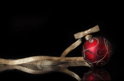 Red Christmas Ornament With Ribbon On Black Stock Photo 