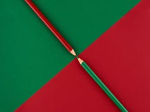 Red and green pencils on a contrasting background royalty free stock photo Red and green pencils on a contrasting background royalty free stock photo