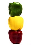 Red green and yellow paprika piled on top of each other on a white background royalty free stock photos Red green and yellow paprika piled on top of each other on a white background royalty free stock photos