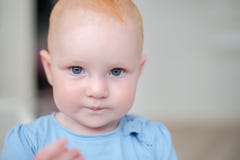 Red-haired child with blue eyes Royalty Free Stock Images Red-haired child with blue eyes Royalty Free Stock Images