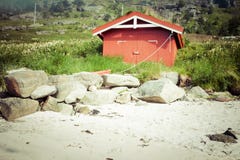 Red house by the see in Lofotn Islands royalty free stock photos Red house by the see in Lofotn Islands royalty free stock photos