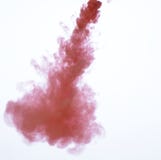 Red ink petering out in water royalty free stock photo Red ink petering out in water royalty free stock photo