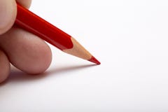 Red pencil on a white surface. royalty free stock images Red pencil on a white surface. royalty free stock images
