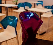 Beautiful red coloured plastic chair of a food court unique photo Stock Photos Beautiful red coloured plastic chair of a food court unique photo Stock Photos