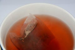Red raspberry herbal tea in cup royalty free stock image Red raspberry herbal tea in cup royalty free stock image