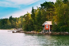 Red Small Finnish Wooden Sauna Log Cabin On Island In Autumn Sea Royalty Free Stock Photo Red Small Finnish Wooden Sauna Log Cabin On Island In Autumn Sea Royalty Free Stock Photo