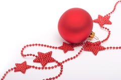 Red Stars And Christmas Bauble Stock Photo