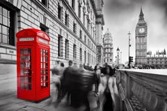 Red telephone booth and Big Ben. London, UK