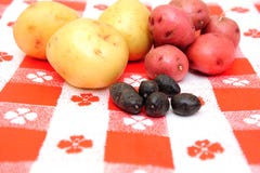 Red, White And Purple Peruvian Potato Royalty Free Stock Photos