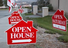 Red and white open house signs