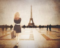 Redhead woman with suitcase come to Paris Stock Photography Redhead woman with suitcase come to Paris Stock Photography