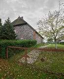 Reed roof fieldstone house listed as monument in Moeckow, Germany Royalty Free Stock Images Reed roof fieldstone house listed as monument in Moeckow, Germany Royalty Free Stock Images