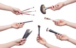 Reeks kosmetische borstels voor make-up in vrouwelijke handen royalty-vrije stock foto's Reeks kosmetische borstels voor make-up in vrouwelijke handen royalty-vrije stock foto's