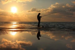 Reflection Of A Fisherman At Dawn Royalty Free Stock Image Reflection Of A Fisherman At Dawn Royalty Free Stock Image