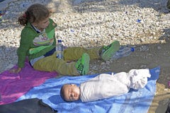 Refugee baby sleeping on the street Lesvos Greece stock image Refugee baby sleeping on the street Lesvos Greece stock image