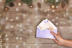 Regalo monetario de la Navidad y del Año Nuevo foto de archivo libre de regalías Regalo monetario de la Navidad y del Año Nuevo foto de archivo libre de regalías