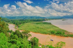 The region of the Golden Triangle, the view from Thailand to Burma. The Golden Triangle. Place on the Mekong River, which borders three countries - Thailand stock photo The region of the Golden Triangle, the view from Thailand to Burma. The Golden Triangle. Place on the Mekong River, which borders three countries - Thailand stock photo