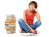 Reizender Kursteilnehmer mit einem Stapel Büchern lizenzfreies stockbild Reizender Kursteilnehmer mit einem Stapel Büchern lizenzfreies stockbild