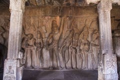Relief on the rock face of Krishna lifting Govardhan Hill in Krishna Mandapam, Mahabalipuram, Tamil Nadu