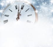 Reloj viejo con las estrellas y los copos de nieve Fotos de archivo libres de regalías