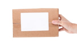 Remettez juger la boîte aux lettres de carton d'isolement sur un fond blanc Images libres de droits