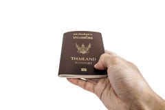 Remettez recevoir ou donner le passeport thaïlandais, foyer sélectif, d'isolement sur le fond blanc Photographie stock Remettez recevoir ou donner le passeport thaïlandais, foyer sélectif, d'isolement sur le fond blanc Photographie stock