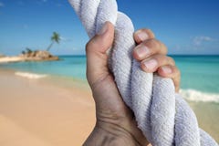 rep för paradis för man för hand för grip för affärsföretagstrandgrab arkivbild rep för paradis för man för hand för grip för affärsföretagstrandgrab arkivbild