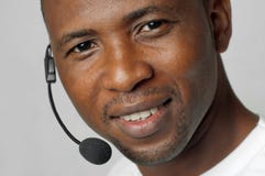 Representante de serviço ao cliente masculino afro-americano ou trabalhador do centro de atendimento Imagem de Stock Representante de serviço ao cliente masculino afro-americano ou trabalhador do centro de atendimento Imagem de Stock