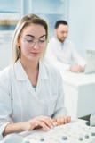 Researchers team work at computer scientific analysing data out scientific test in chemistry laboratory Stock Image Researchers team work at computer scientific analysing data out scientific test in chemistry laboratory Stock Image