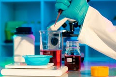 Researchers work in modern scientific lab. Stock Images Researchers work in modern scientific lab. Stock Images